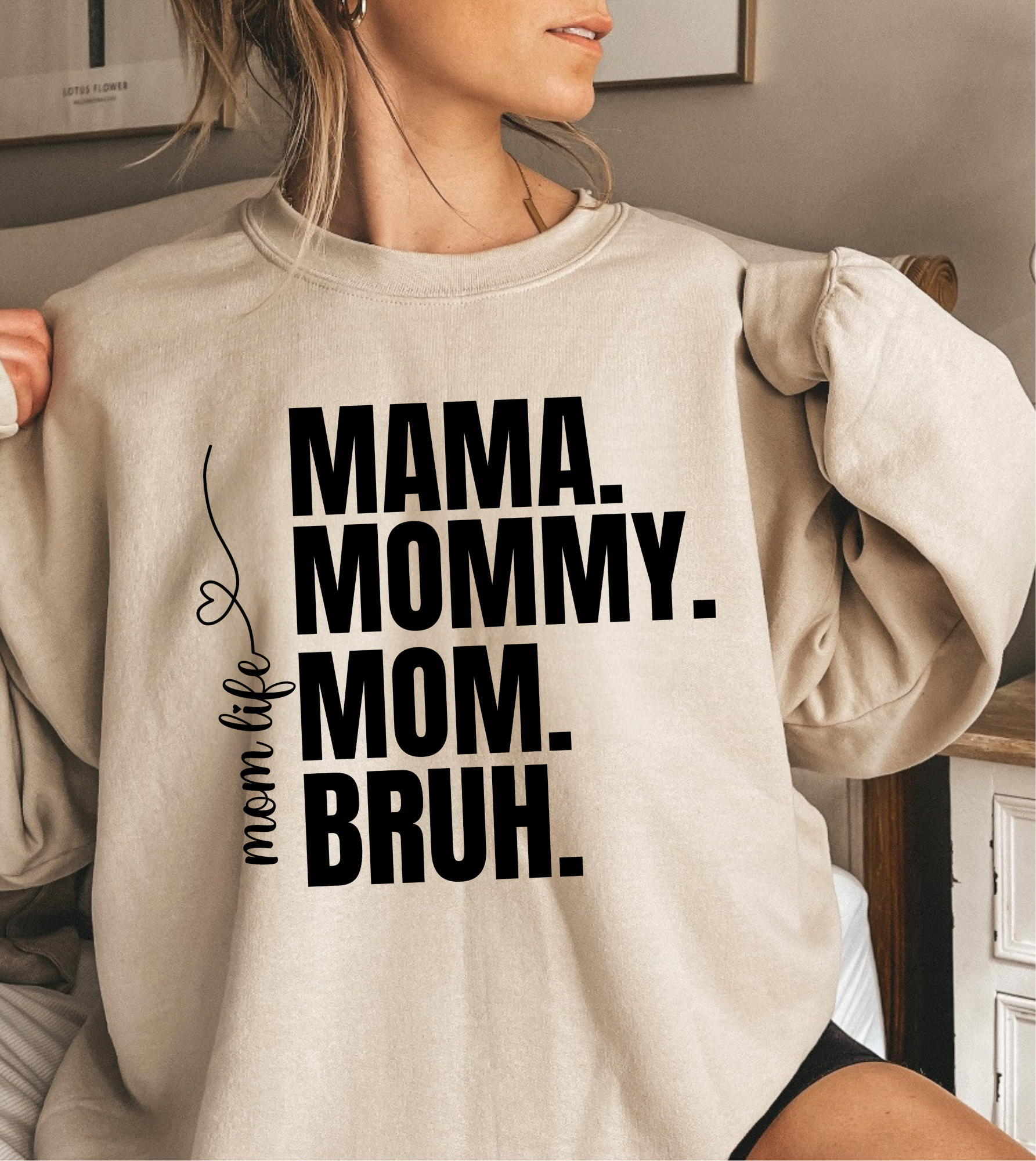 Cozy cream crewneck sweater with 'Mama Mommy Mom Bruh' text in modern typography